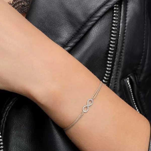 Leaf Jewelry Glücksbändchen Infinity mit Diamanten, 18 K Weißgold, Beige Letzte 2 Tage