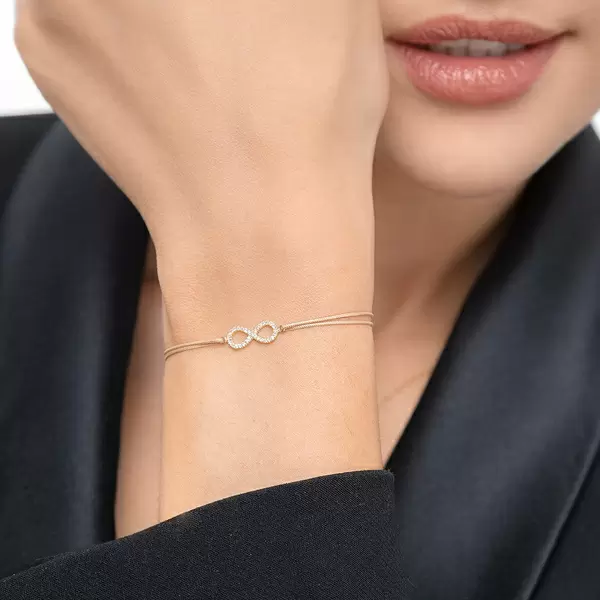 Leaf Jewelry Glücksbändchen Infinity mit Diamanten, 18 K Weißgold, Beige Letzte 2 Tage