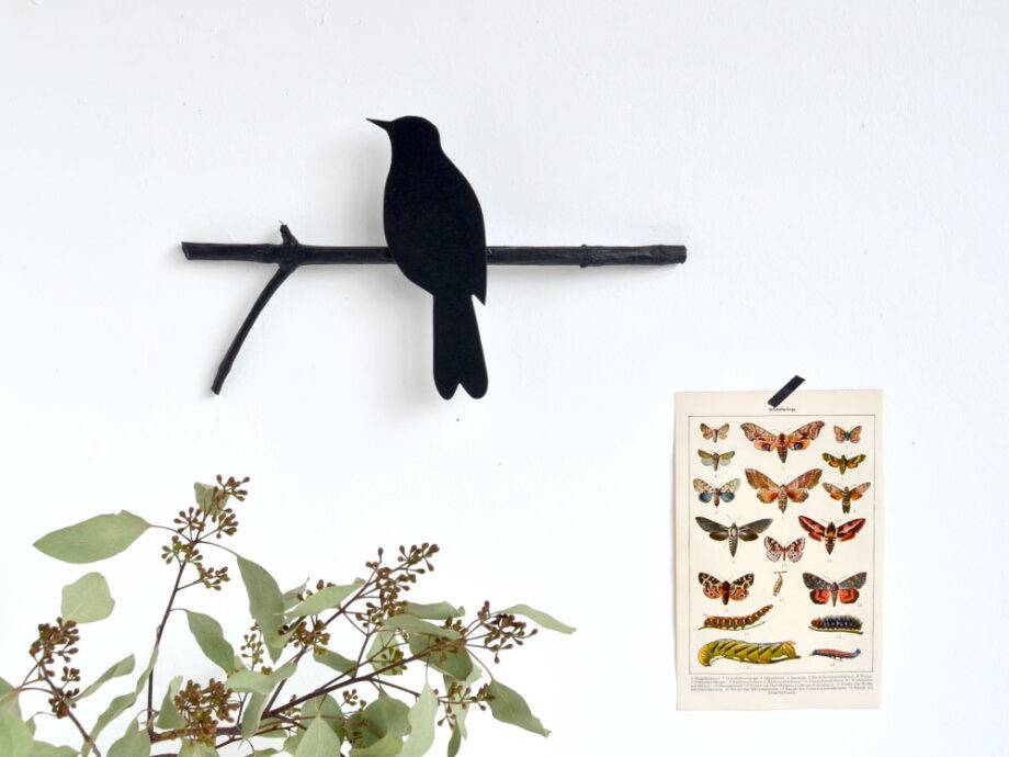 Renna Deluxe Amsel in Fraktur auf dem Ast Osterangebot
