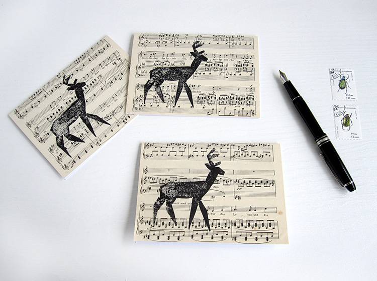 Renna Deluxe Klappkarte mit Hirsch auf Notenpapier Fabrikpreis